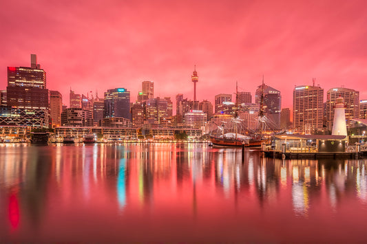 Color photograph of Rose Dawn warm pink sky Darling Harbour Sydney sunrise ephemeral light