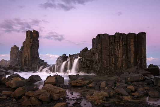 Bombo Quarry waterfall purple twilight dusk basalt columns South Coast NSW with lavender sky