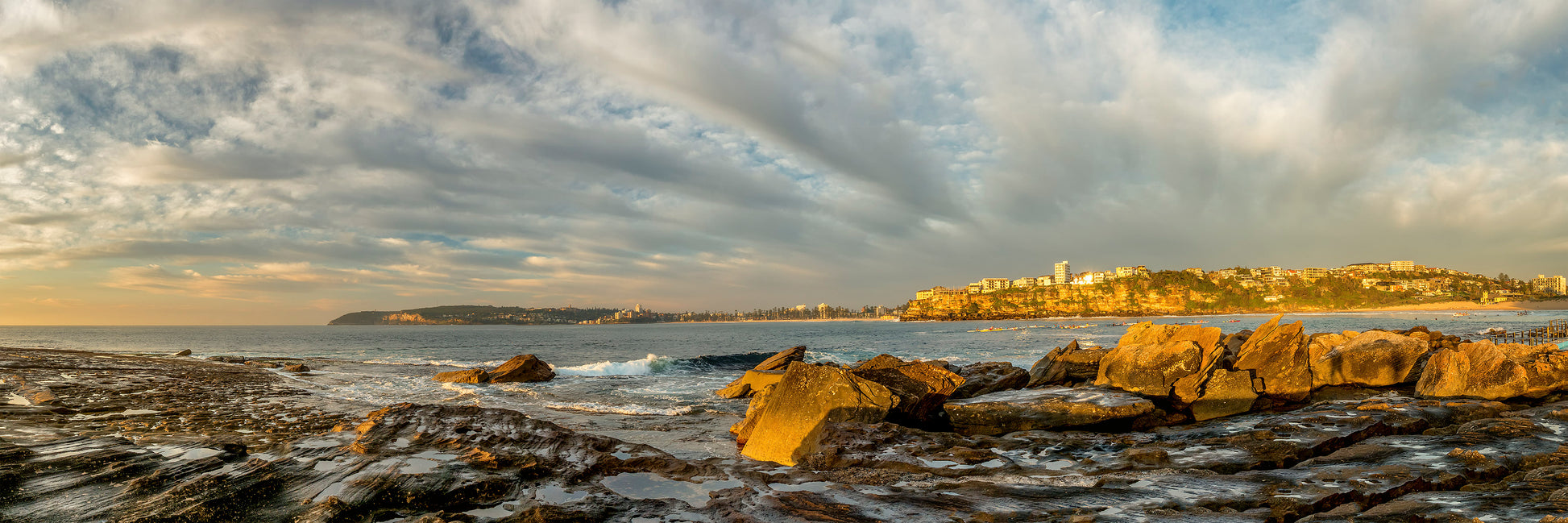 Freshwater Headland Sydney northern beaches with Queenscliff Manly and kayakers on turquoise water