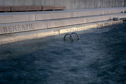 Color photograph still water surface reflections contemplative serene spiritual photography calm Sydney