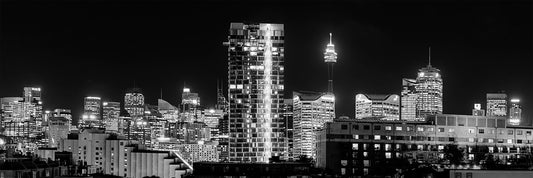 Black and white panoramic photograph of Sydney CBD skyline at night from Pyrmont penthouse