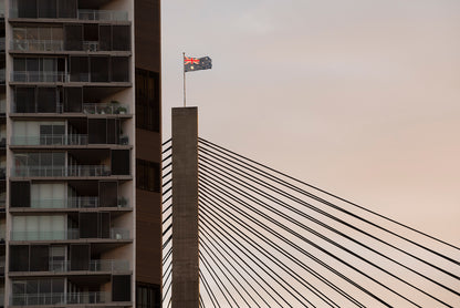 Color photograph Australian flag wind motion unfurling sky patriotic Sydney photography
