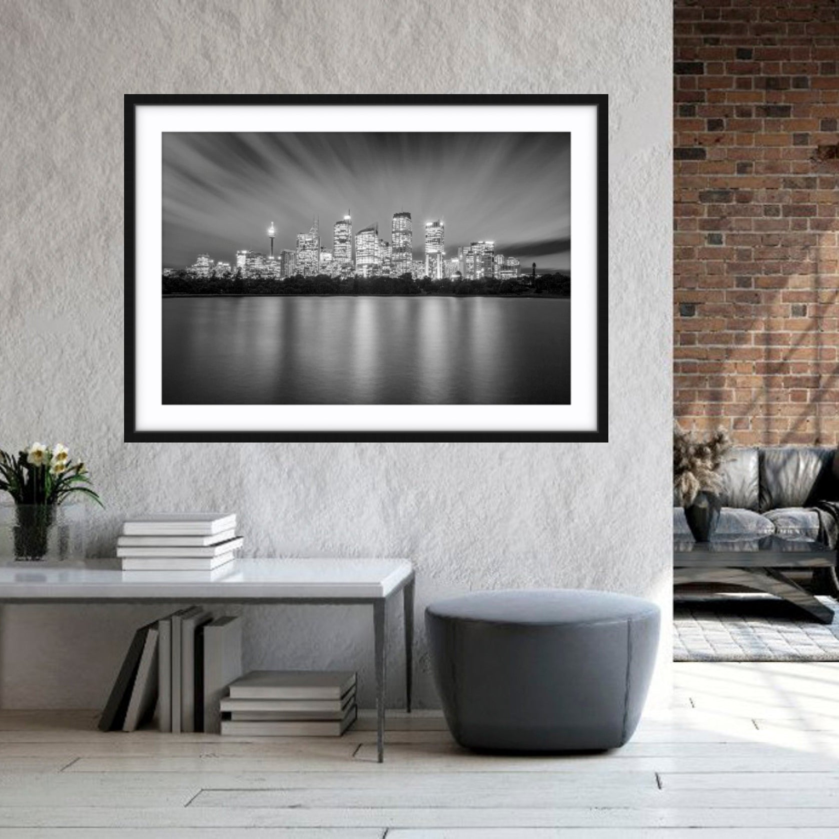 Framed fine art Sydney CBD black and white print on a wall in a modern living room.