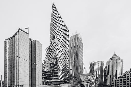 Black and white architectural photograph of Quay Quarter Tower Sydney with harbour views Opera House and Harbour Bridge