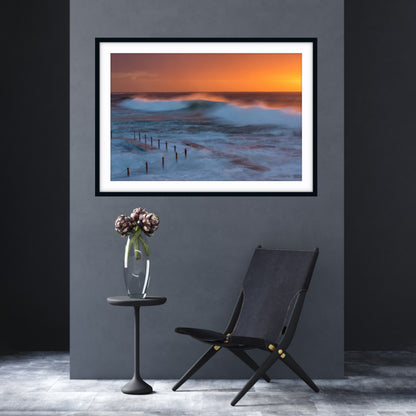 Framed photographic artwork of a sunrise at South Curl Curl, Northern Beaches. 